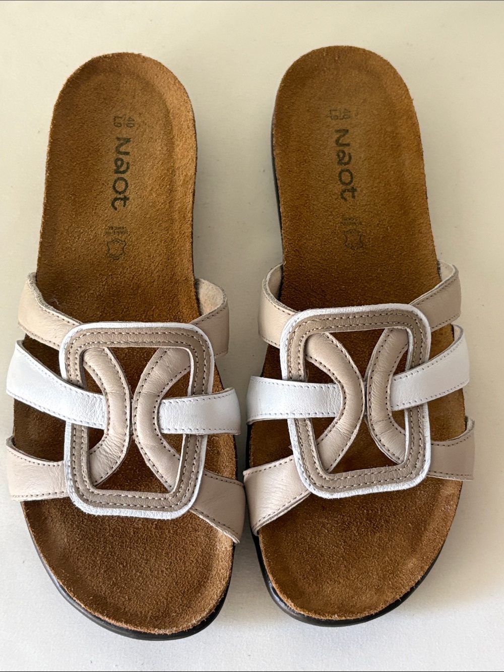 Naot Liv Leather Slide Sandals Features Geometric Buckle Design & Sueded Footbed